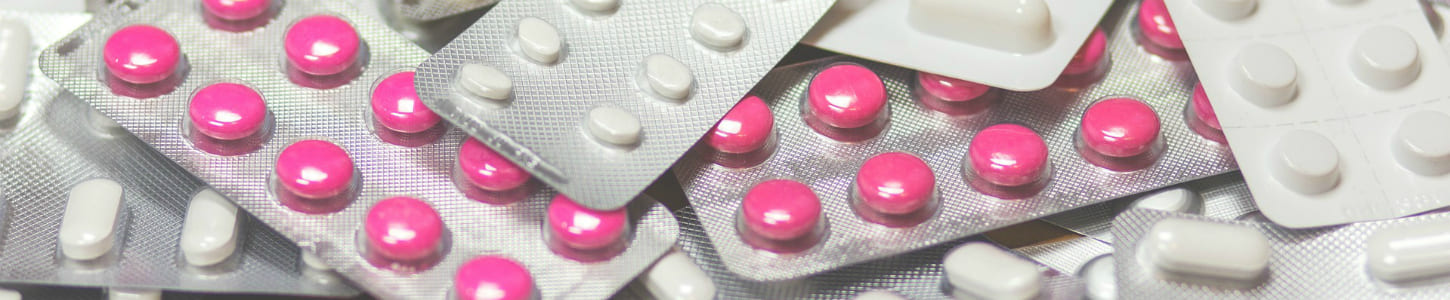 Medicine tablets arranged for safe dosage education